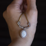 Vintage necklace in 18K gold with opal (3.50ct approx.) And diamonds (0.36ctw approx.), 60s / 70s