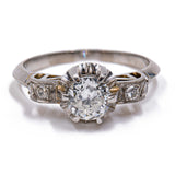 Anello antico in platino con diamante centrale (0.50ct) e contorno di diamanti . Anni '30