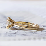 Solitaire in 18K gold with 1.67ct brilliant cut diamond