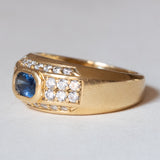 Anello vintage in oro 18K con topazio blu e diamanti (0.56ctw ca.), anni ‘70/‘80