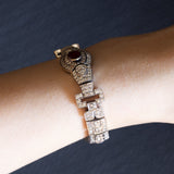 Bracciale semirigido vintage in oro bianco 18K con rubino naturale (0.90ct ca.) e diamanti (6.30ctw ca.), anni ‘60