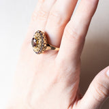 Anello vintage in oro 18K con granati, anni ‘60
