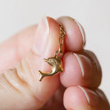 Braccialetto vintage in oro 18K con delfini, anni ‘80/‘90