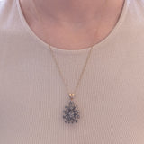Antique pendant in 18K gold and silver with rosette cut diamonds, early 1900s