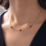 Demi parure comprendente collana e orecchino moderni in oro 18K con coccinelle con smalti, anni ‘90