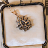 Antique pendant in 18K gold and silver with rosette cut diamonds, early 1900s