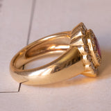 Anello vintage in oro 18K con rubino (1.20ct ca.) e diamanti (0.90ct ca.), anni ‘60