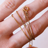 Collana vintage in oro 14K con punto luce di 0.10ct ca., anni ‘70/‘80