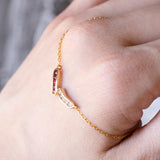 Collana vintage in oro 18K con rubini (0.25ctw ca.) e diamanti (0.25ctw ca.), anni ‘70