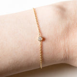 Braccialetto vintage in oro 18K con punto luce (0.05ct ca.), anni ‘70/‘80