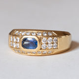 Anello vintage in oro 18K con topazio blu e diamanti (0.56ctw ca.), anni ‘70/‘80