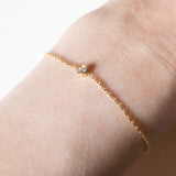 Braccialetto vintage in oro 18K con punto luce (0.05ct ca.), anni ‘70/‘80