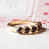 🥀 Veretta vintage in oro 18K con granati, anni ‘40/‘50