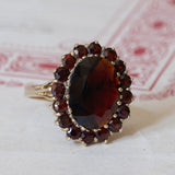 Vintage 8K gold daisy ring with garnets, 1960s