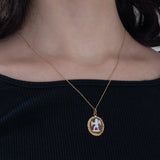 Ciondolo vintage in oro 18K con cammeo su conchiglia, anni ‘60