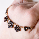 Collana vintage in oro 8K con granati, anni ‘50/‘60