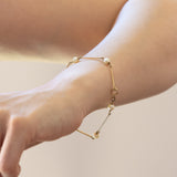 Braccialetto semirigido vintage in oro 14K con perle, anni ‘70