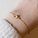 Braccialetto vintage in oro 18K con delfini, anni ‘80/‘90