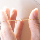 Braccialetto vintage in oro 18K con punto luce (0.05ct ca.), anni ‘70/‘80