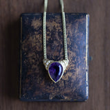 Collier vintage in oro 14K con ametista (7.80ct ca.) e diamanti (0.08ct ca.), anni ‘60/‘70
