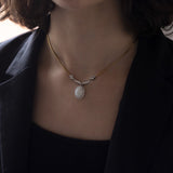 Vintage necklace in 18K gold with opal (3.50ct approx.) And diamonds (0.36ctw approx.), 60s / 70s
