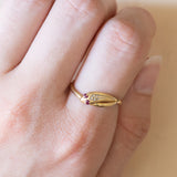 Anello a serpente vintage in oro 18K con rubini, anni ‘70