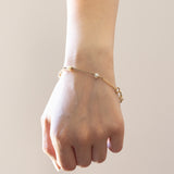Braccialetto semirigido vintage in oro 14K con perle, anni ‘70