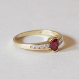 Vintage 14K gold ring with ruby (0.20ct approx.) And diamonds (0.15ctw approx.), 1970s