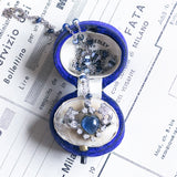 Collana in oro bianco 18K con zaffiri, opali e diamanti, anni ‘40