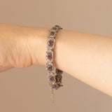 Braccialetto semirigido antico in oro giallo 18K e argento con rubini e diamanti, anni ‘20/‘30