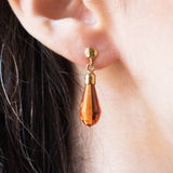 Orecchini vintage pendenti in oro giallo 18K con zaffiri arancioni, anni '70/'80