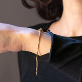 Braccialetto vintage in oro giallo 14K con diamante (0.01ct ca.), anni ‘60/‘70