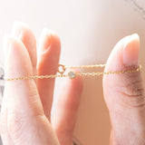 Braccialetto vintage in oro 18K con punto luce (0.05ct ca.), anni ‘70/‘80