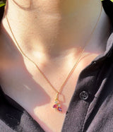 Collana con pendente in oro 18K con diamanti (0.06ctw ca.) e rubini, anni ‘70