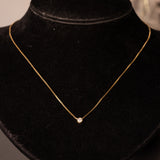 Collana vintage in oro 14K con punto luce di 0.10ct ca., anni ‘70/‘80
