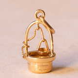 Ciondolo vintage a forma di pozzo in oro 18K