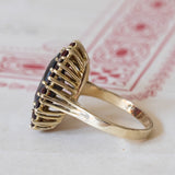 Vintage 8K gold daisy ring with garnets, 1960s