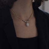 Vintage necklace in 18K gold with opal (3.50ct approx.) And diamonds (0.36ctw approx.), 60s / 70s