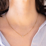Collana vintage in oro 14K con punto luce di 0.10ct ca., anni ‘70/‘80