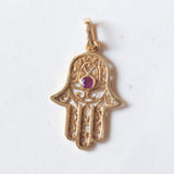 Ciondolo “Mano di Fatima” vintage in oro 18K con rubino, anni ‘70
