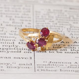 Anello vintage in oro 18K con rubini e diamanti (0.04ctw ca.), anni ‘70