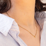 Collana vintage in oro 14K con punto luce di 0.10ct ca., anni ‘70/‘80