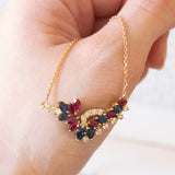 Vintage necklace in 18K gold with rubies, sapphires and diamonds (0.30ctw approx.), 1970s / 1980s