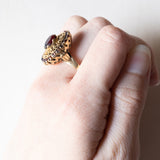 Anello vintage in oro 18K con granati, anni ‘60