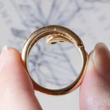 Anello a serpente vintage in oro giallo 18K con smeraldi e diamanti (0.60ctw ca.), anni ‘60