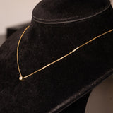 Collana vintage in oro 14K con punto luce di 0.10ct ca., anni ‘70/‘80