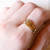 Coppia di anelli vintage in oro 18K con diamanti (0.08ctw ca.), anni ‘70