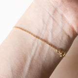 Braccialetto vintage in oro 18K con punto luce (0.05ct ca.), anni ‘70/‘80
