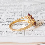 Anello vintage in oro 18K con rubini e diamanti (0.04ctw ca.), anni ‘70