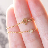 Braccialetto vintage in oro 18K con punto luce (0.05ct ca.), anni ‘70/‘80